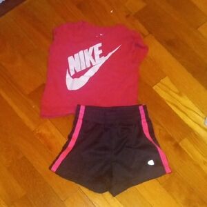 girl 2t pink NIKE tee and black shorts